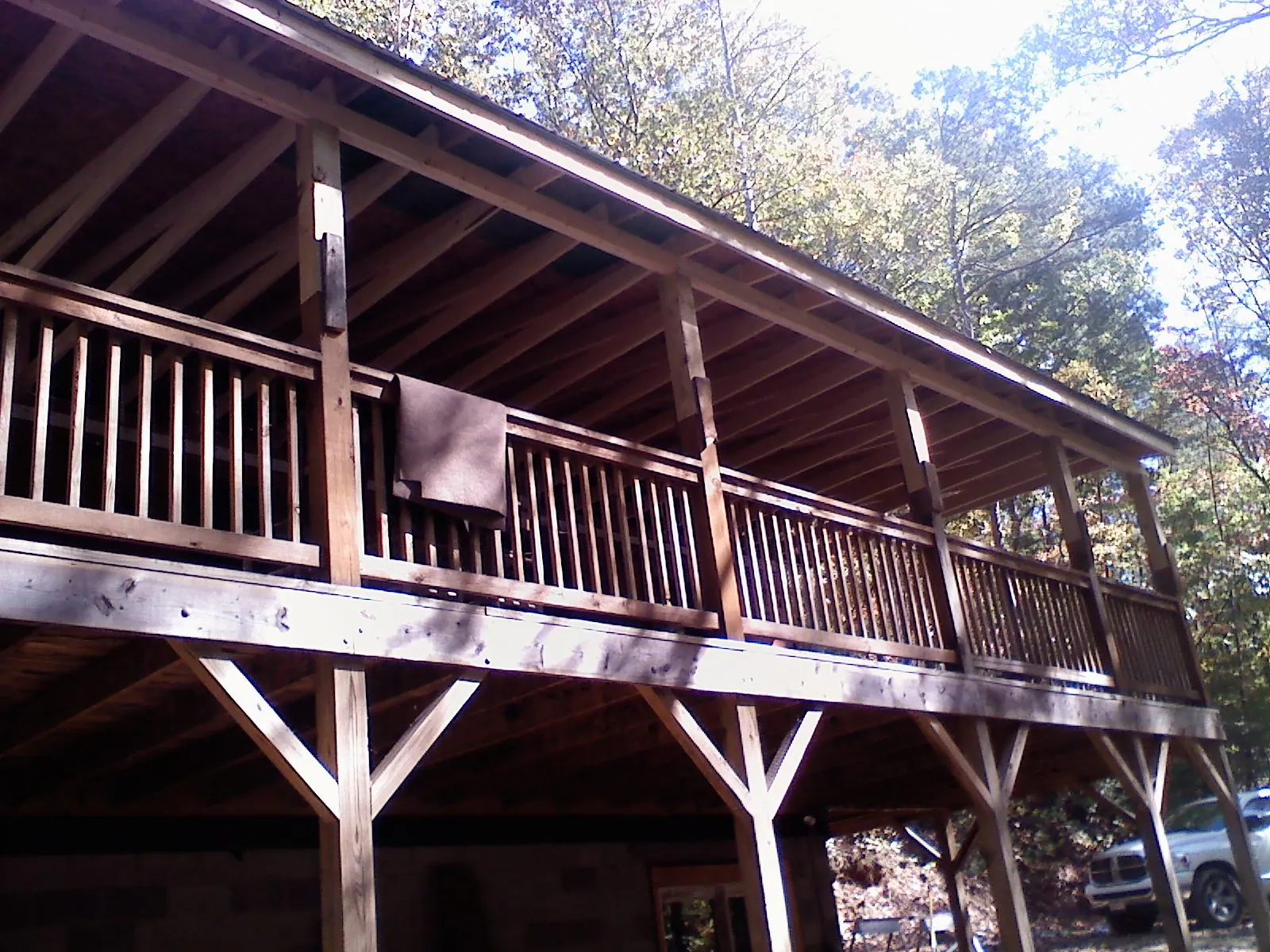 Timber framing under a new elevated porch and deck — Roof Leak Repair in Mormon Lake by Roofing Brothers